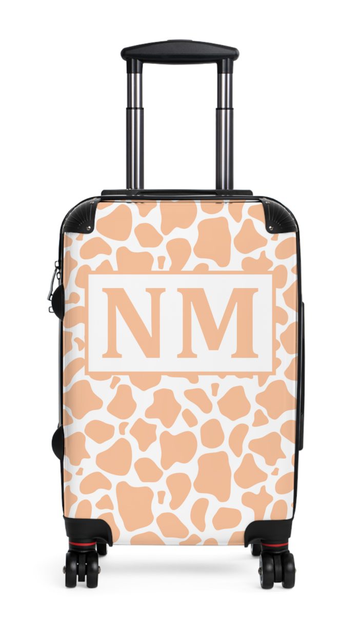 Custom Cow Print Suitcase - A personalized luggage adorned with a unique cow print design, perfect for travelers who want to add a touch of individuality to their journeys.